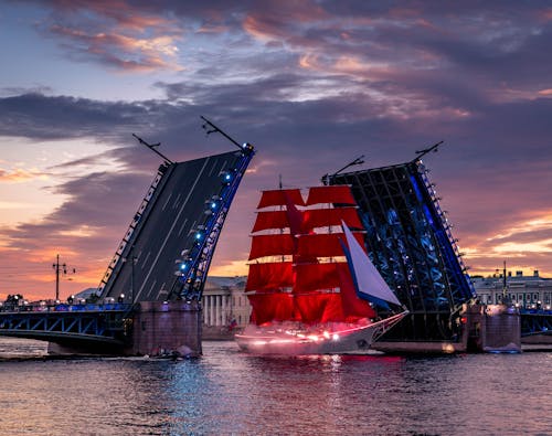 Red and Blue Ship on Sea