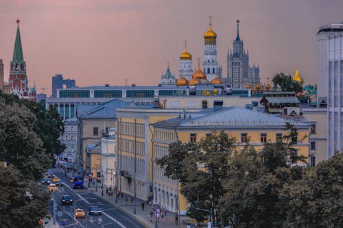 Street in Moscow with Basilicas behind at Dusk