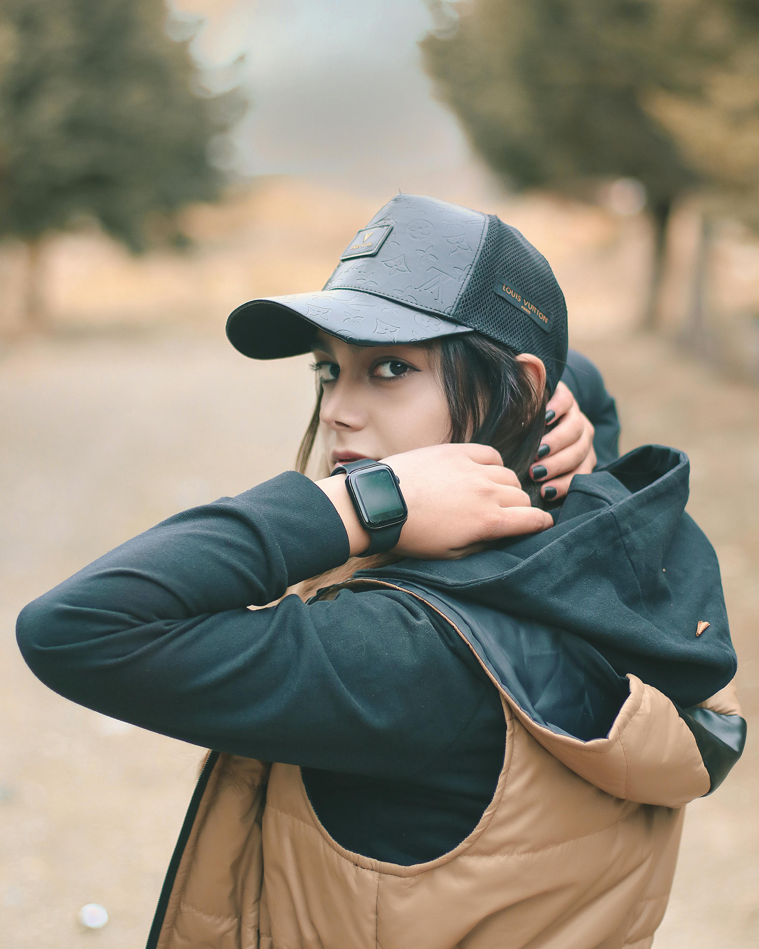 A Woman Wearing Black Cap · Free Stock Photo