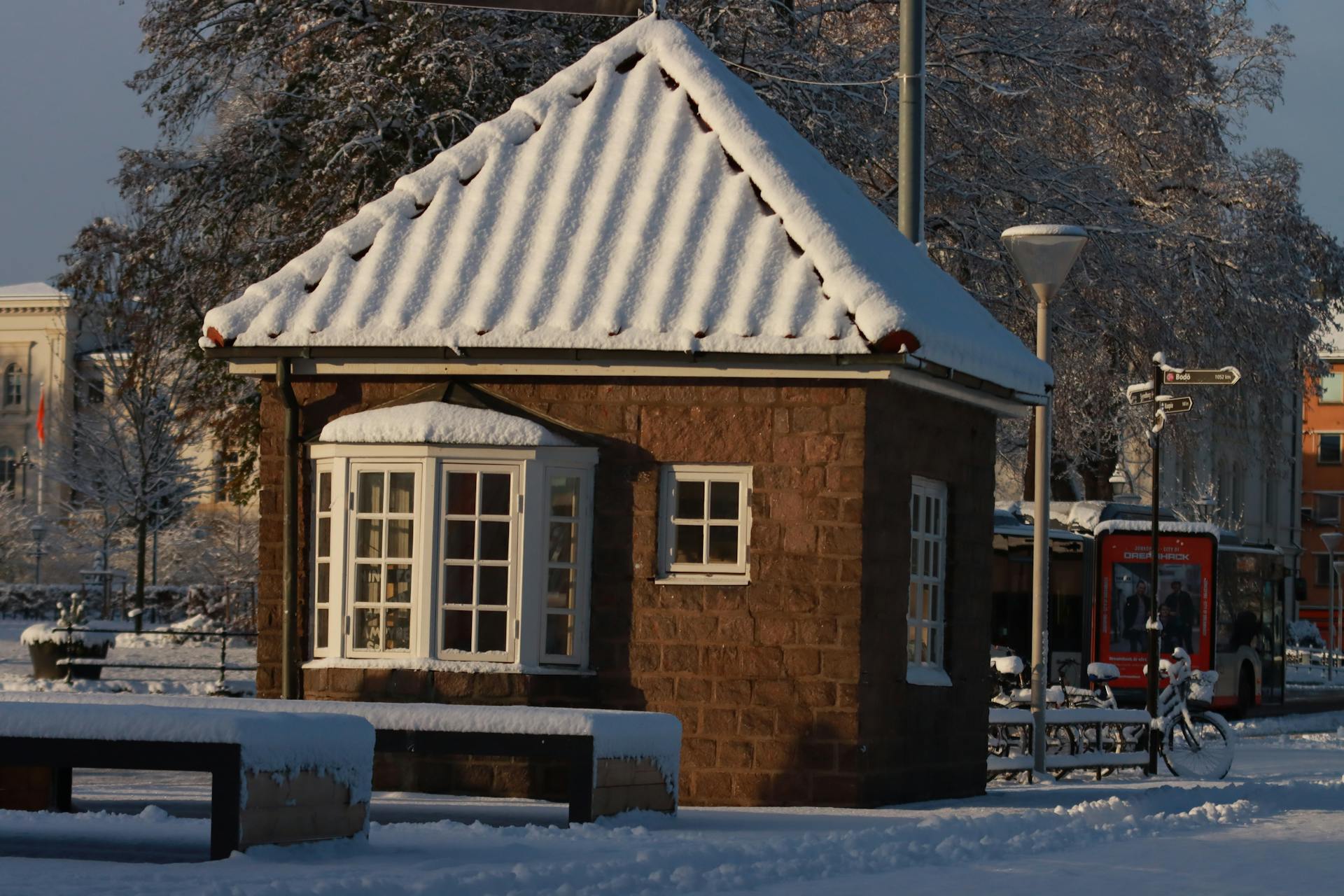 Building with the Roof Covered in Snow