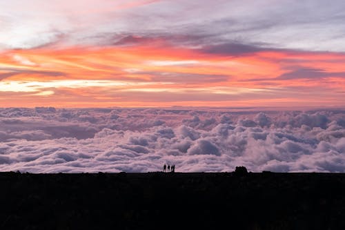 Бесплатное стоковое фото с закат, люди, облака
