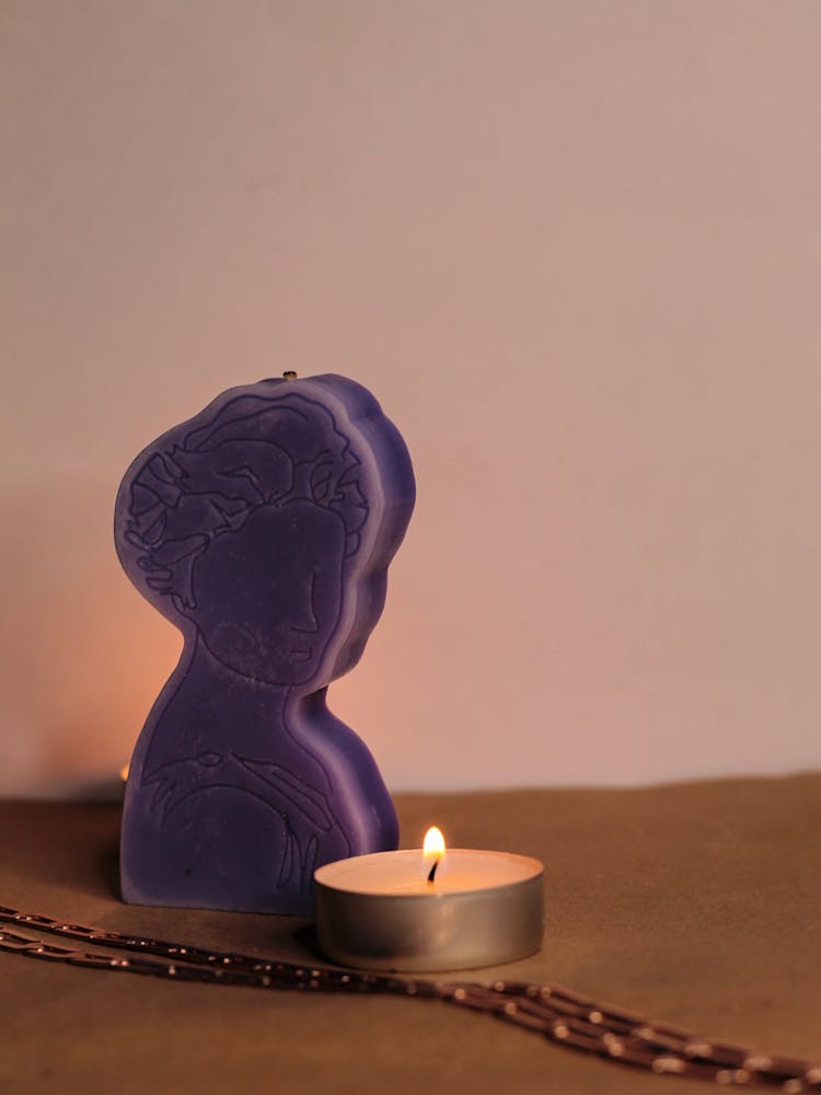 Purple Candle In Human Figure