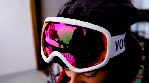 Photo of Person Wearing White Goggles