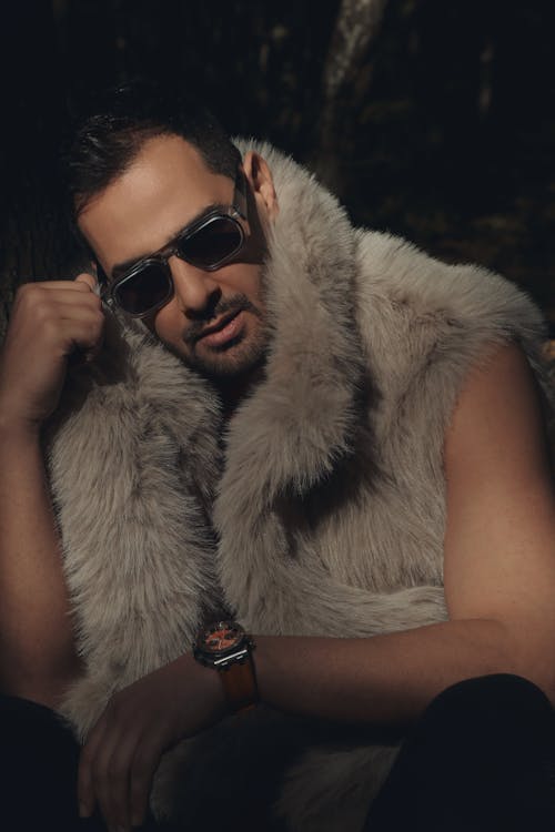 Man Wearing a Fur Vest