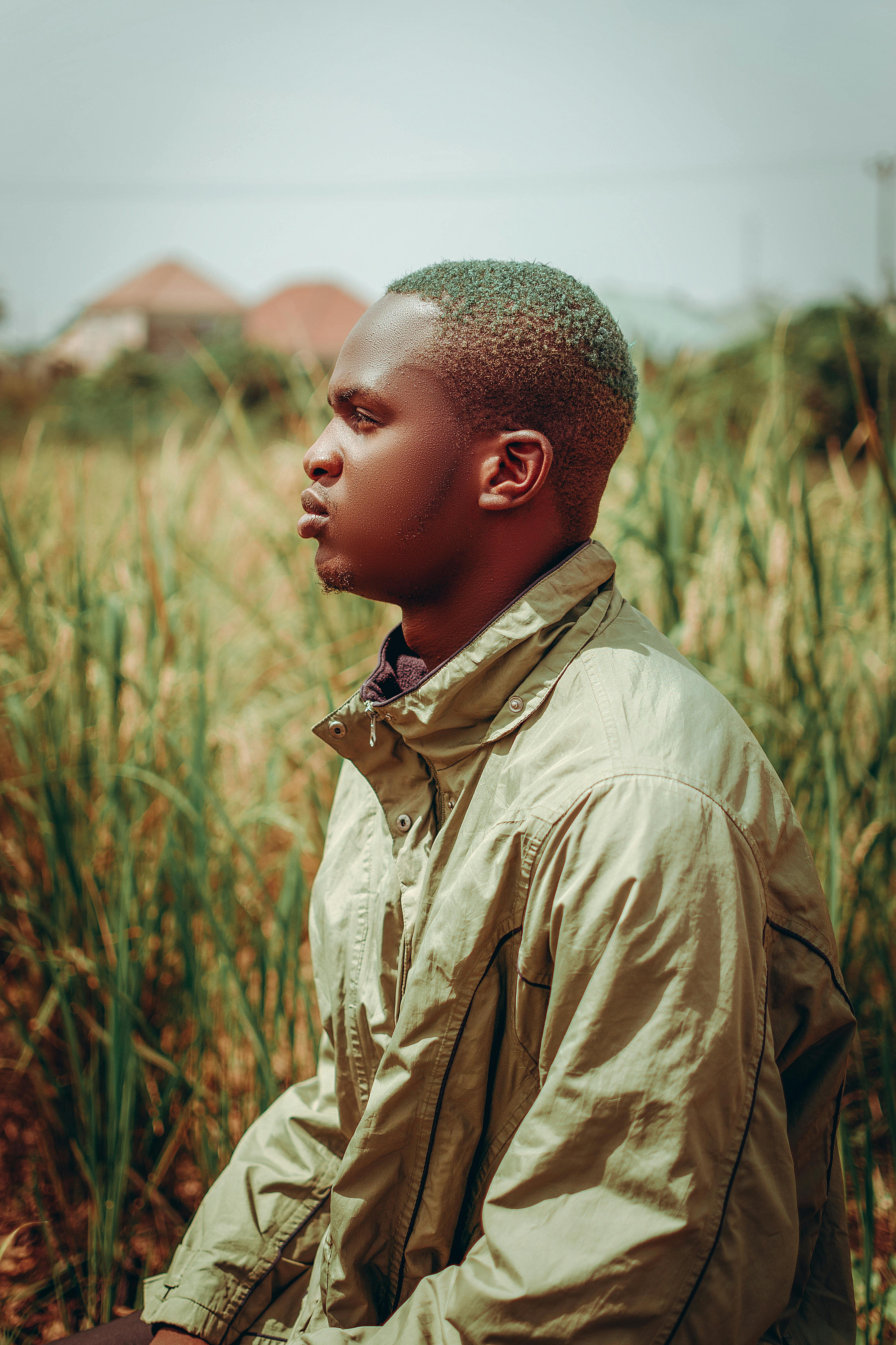Side View of Man in Brown Jacket · Free Stock Photo
