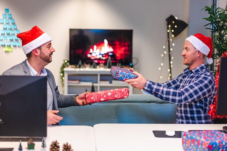 Men Exchanging Gifts