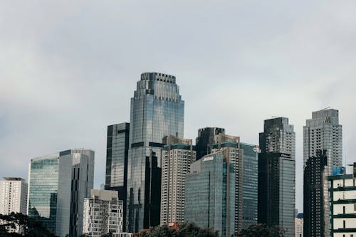 Glass Skyscrapers in Jakarta, Indonesia under Cloudy Sky