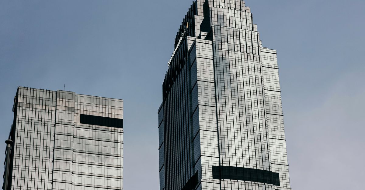 Modern skyscrapers reaching into the clear blue skies of Jakarta, Indonesia.