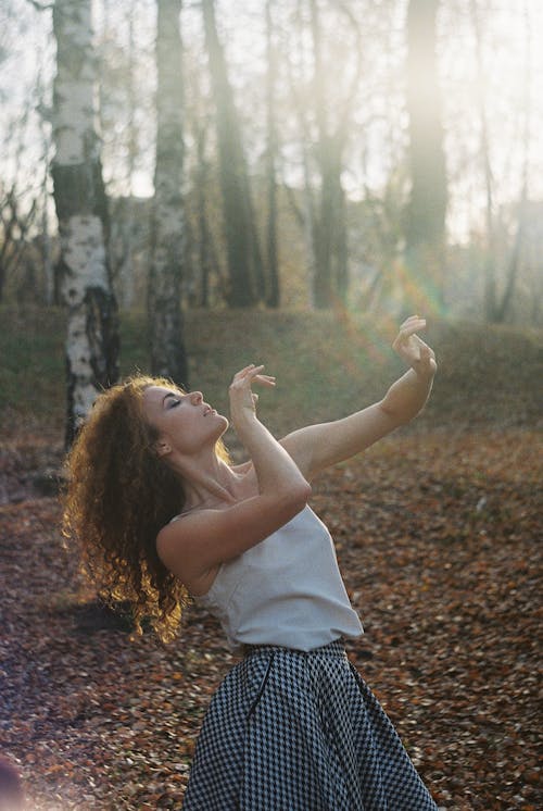 Free Woman Forest Bathing in Autumn Stock Photo