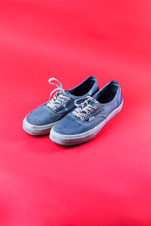 Blue Low Cut Vans on Pink Surface · Free Stock Photo