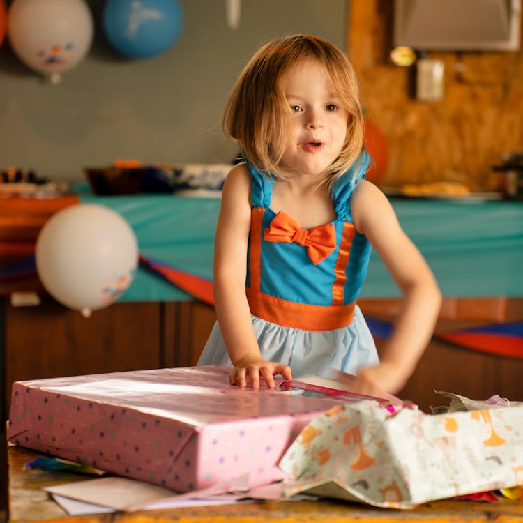 Girl Opening Her Gift Box 