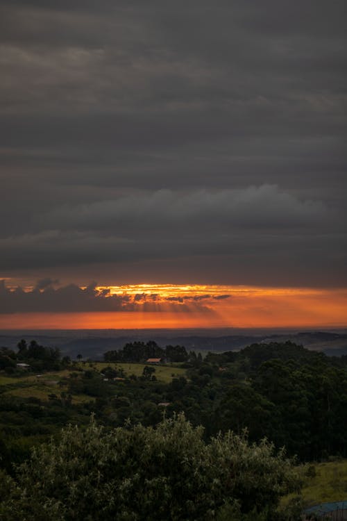 Green Mountain Under a Cloudy Sky