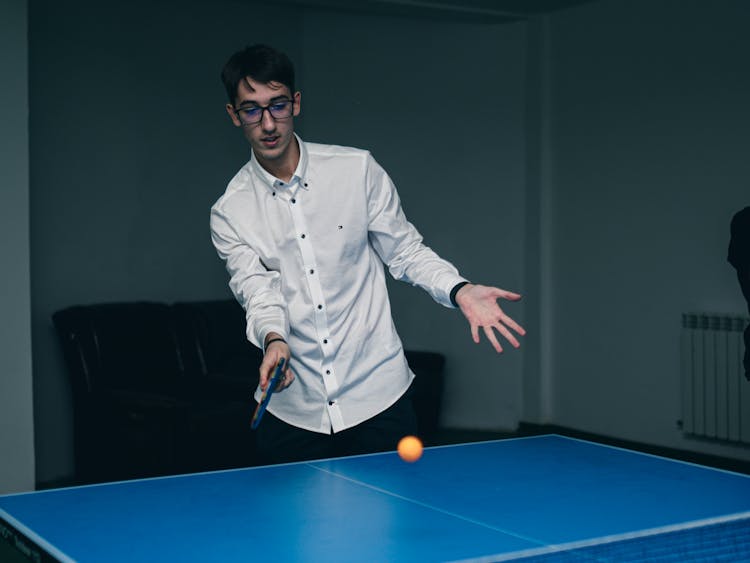 Man Playing Table Tennis