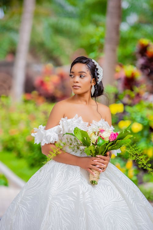 Woman in White Wedding Gown Looking Sideways 