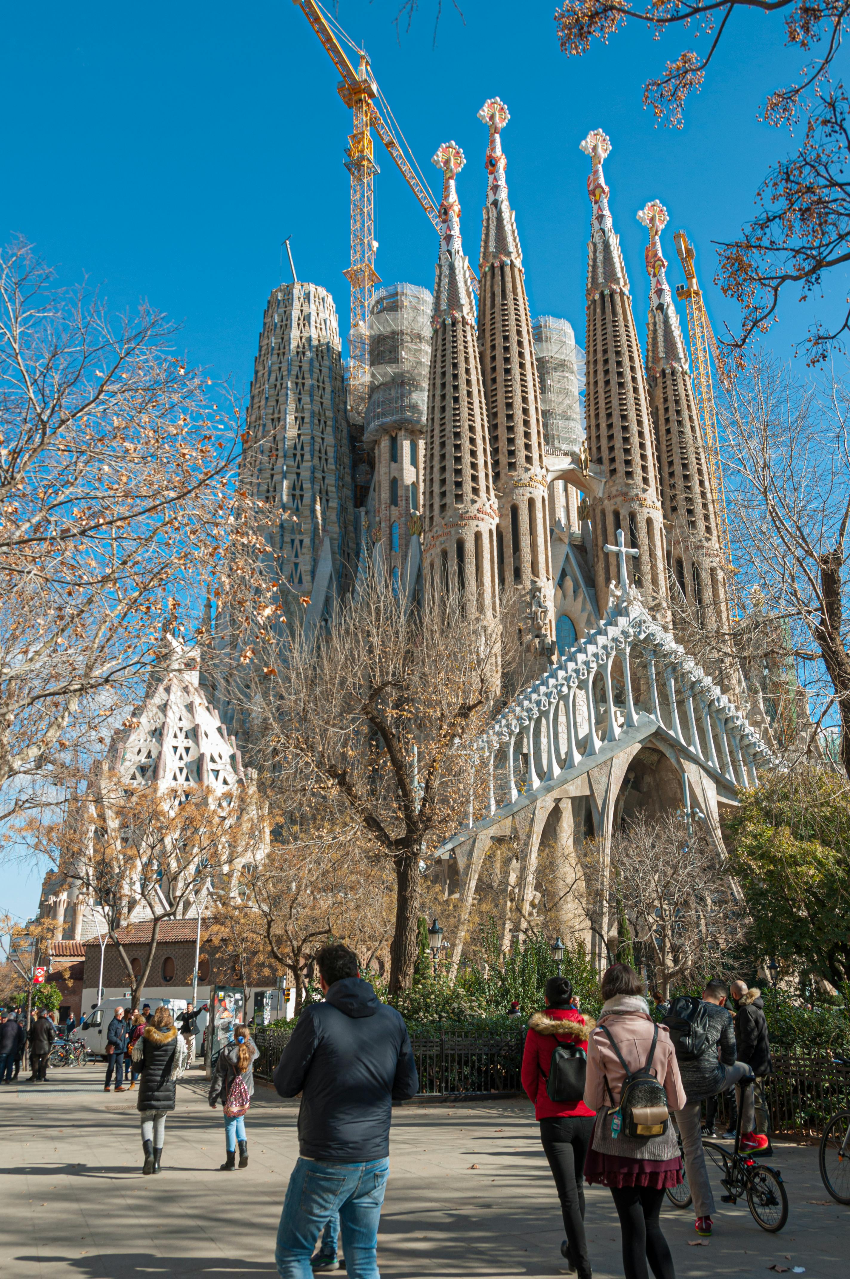 people walking near cathedral of barcelona