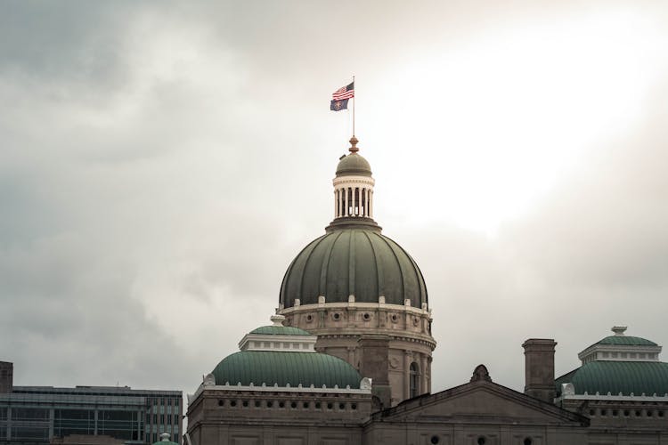 Flags On Top Of The Indiana Statehouse