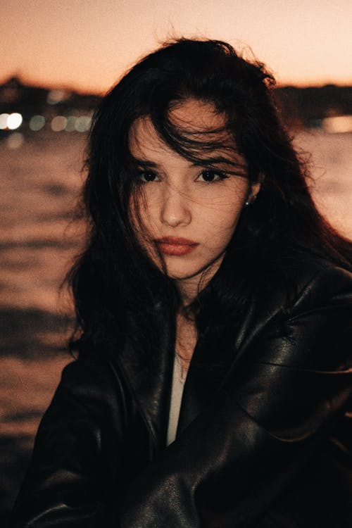 Portrait of Young Woman Wearing Black Leather Jacket