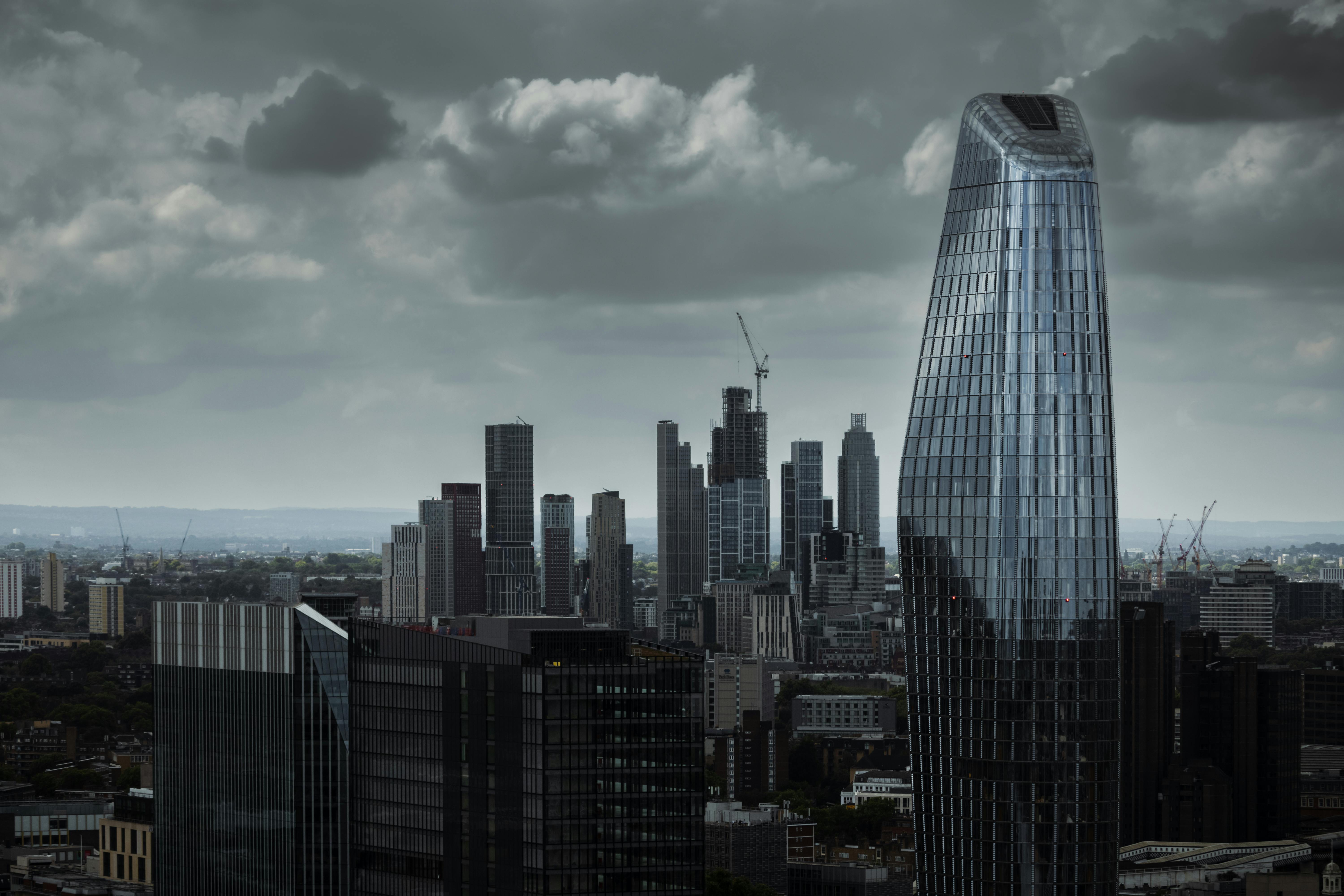 city skyline under cloudy sky