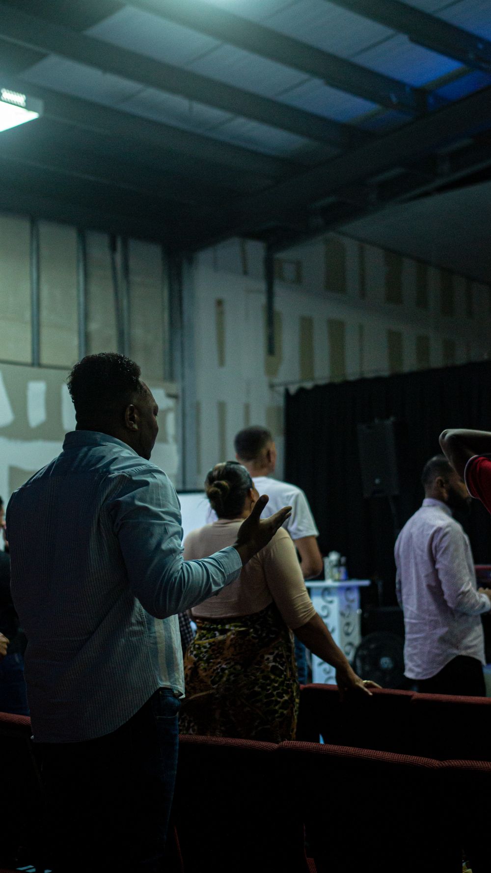A congregation gathered together in a welcoming church setting