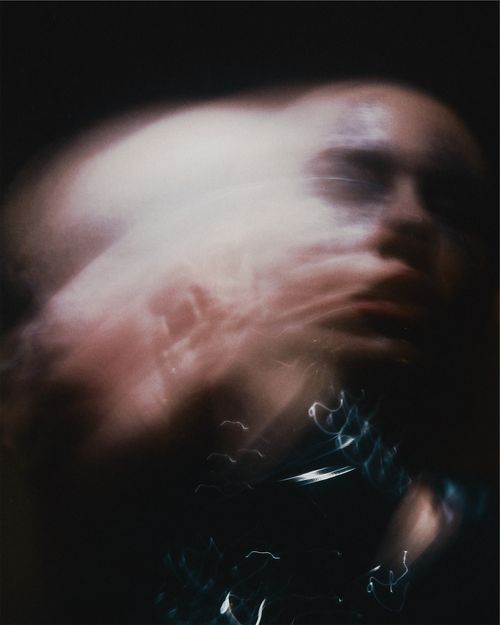 Free Artistic blurred portrait capturing dynamic motion, creating a surreal effect. Stock Photo