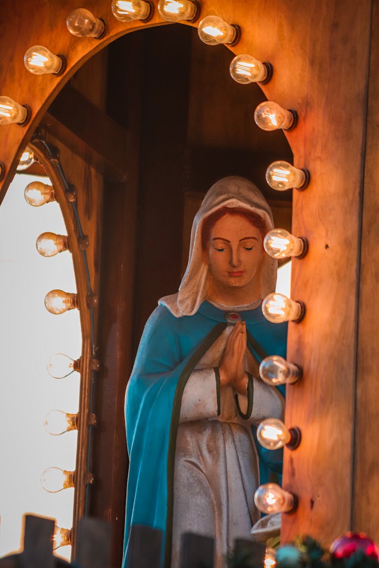 Holy Mary Figurine In Mirror