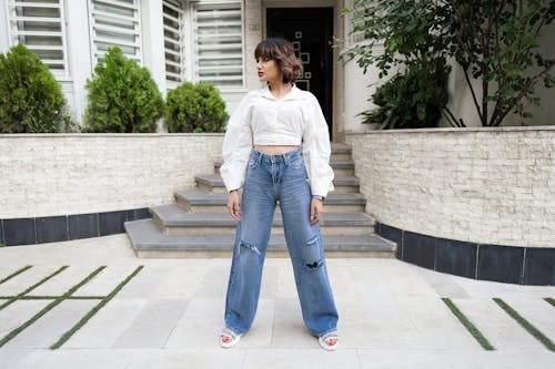 Woman in Jeans Posing on Street