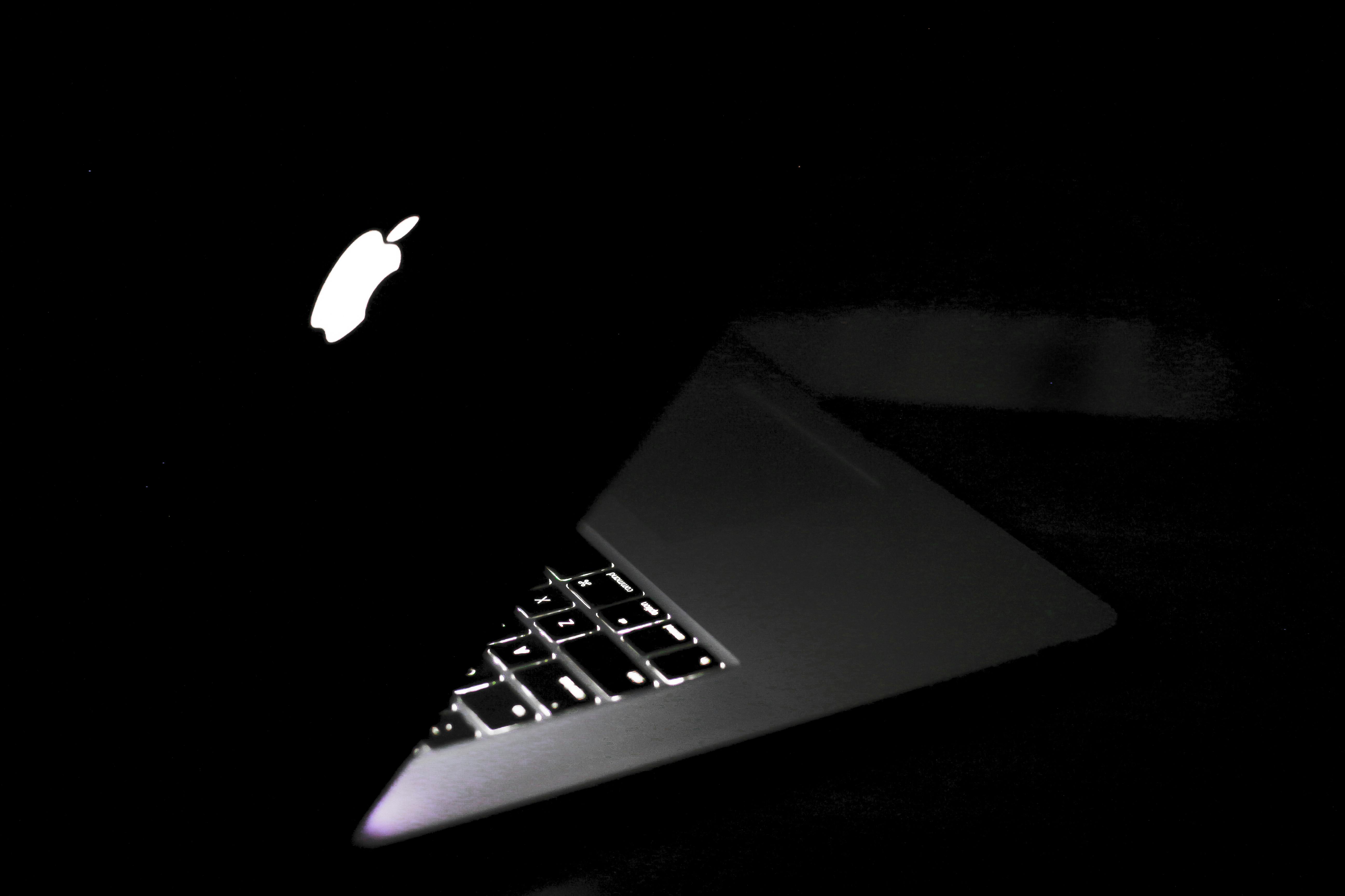 Free stock photo of laptop coding macbook dark light keyboard computer