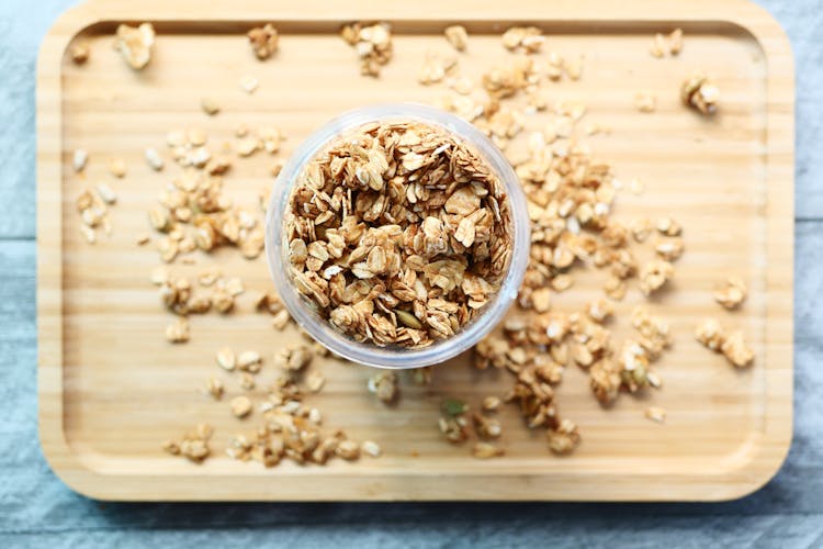 Cereal In Glass Jar On Board