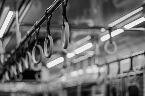 Close up of Handles in Bus in Black and White