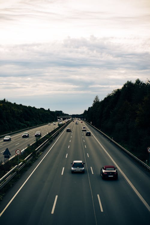 Gratis stockfoto met auto's, snelweg, straat