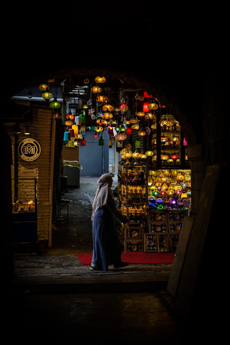 Woman In Hijab At Bazaar At Night