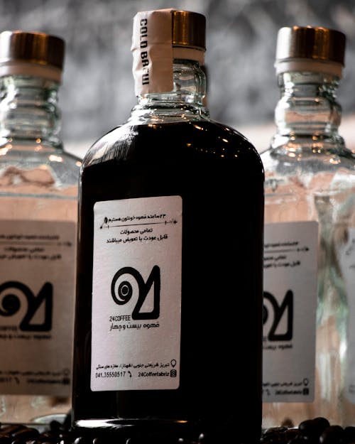 Close-up of Bottles with Cold Brew Coffee 