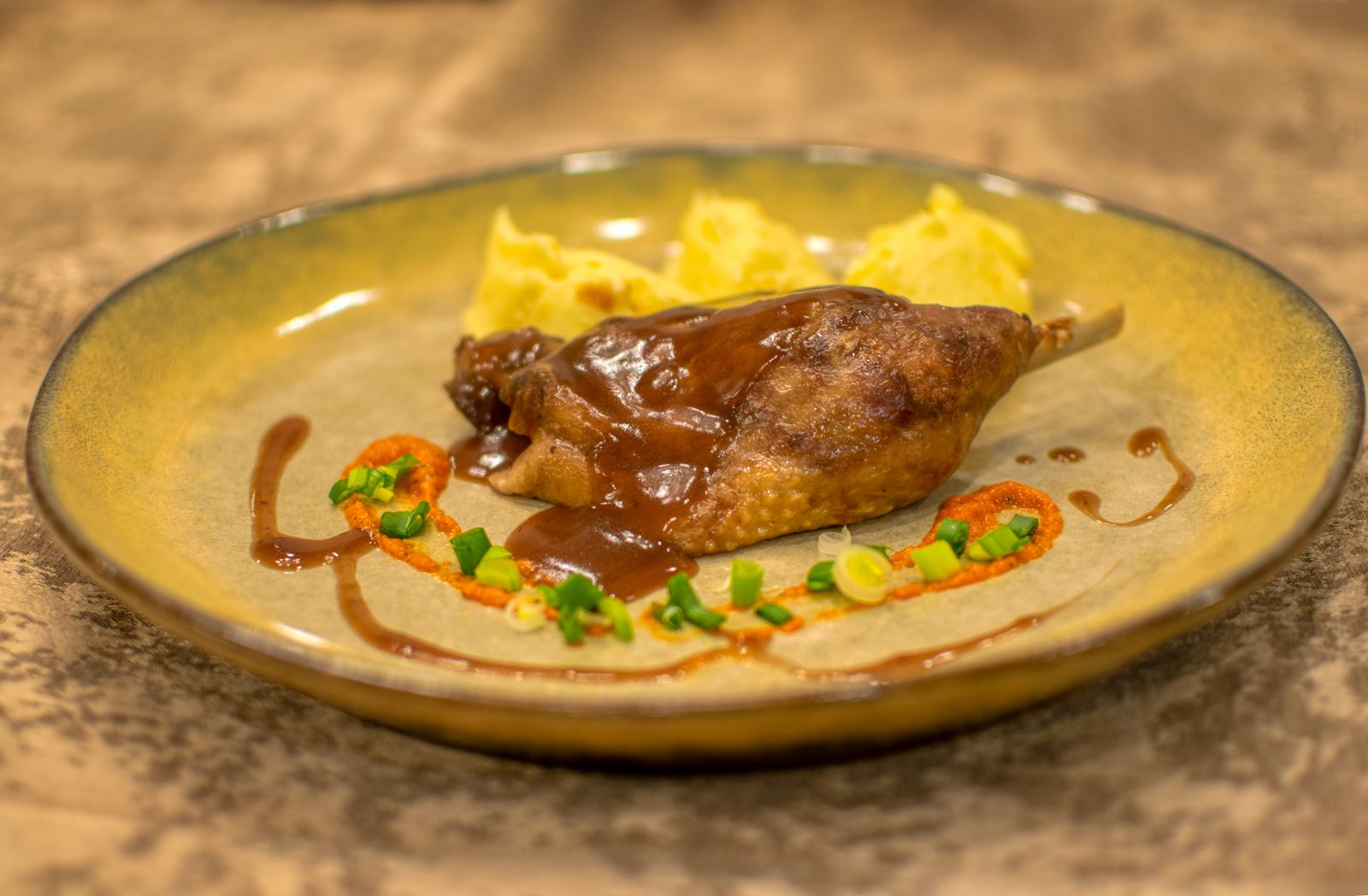 Confit de canard met pruimenjus