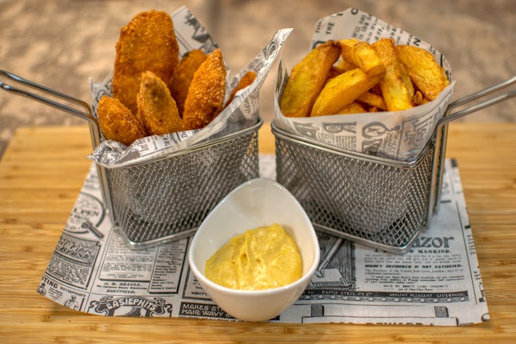 Deep Fried Chicken Tenders And Fries With Sauce 