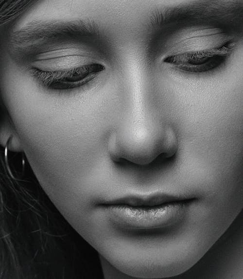Close Up Photo of a Woman in Grayscale Photography