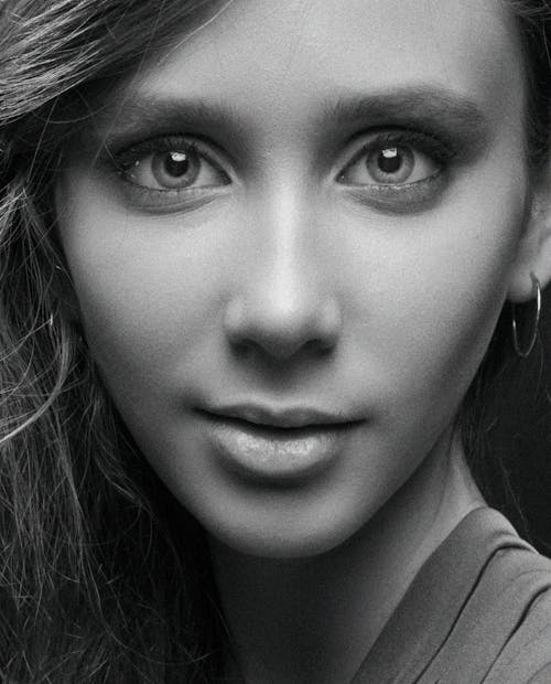 Woman's Face in Grayscale Photography