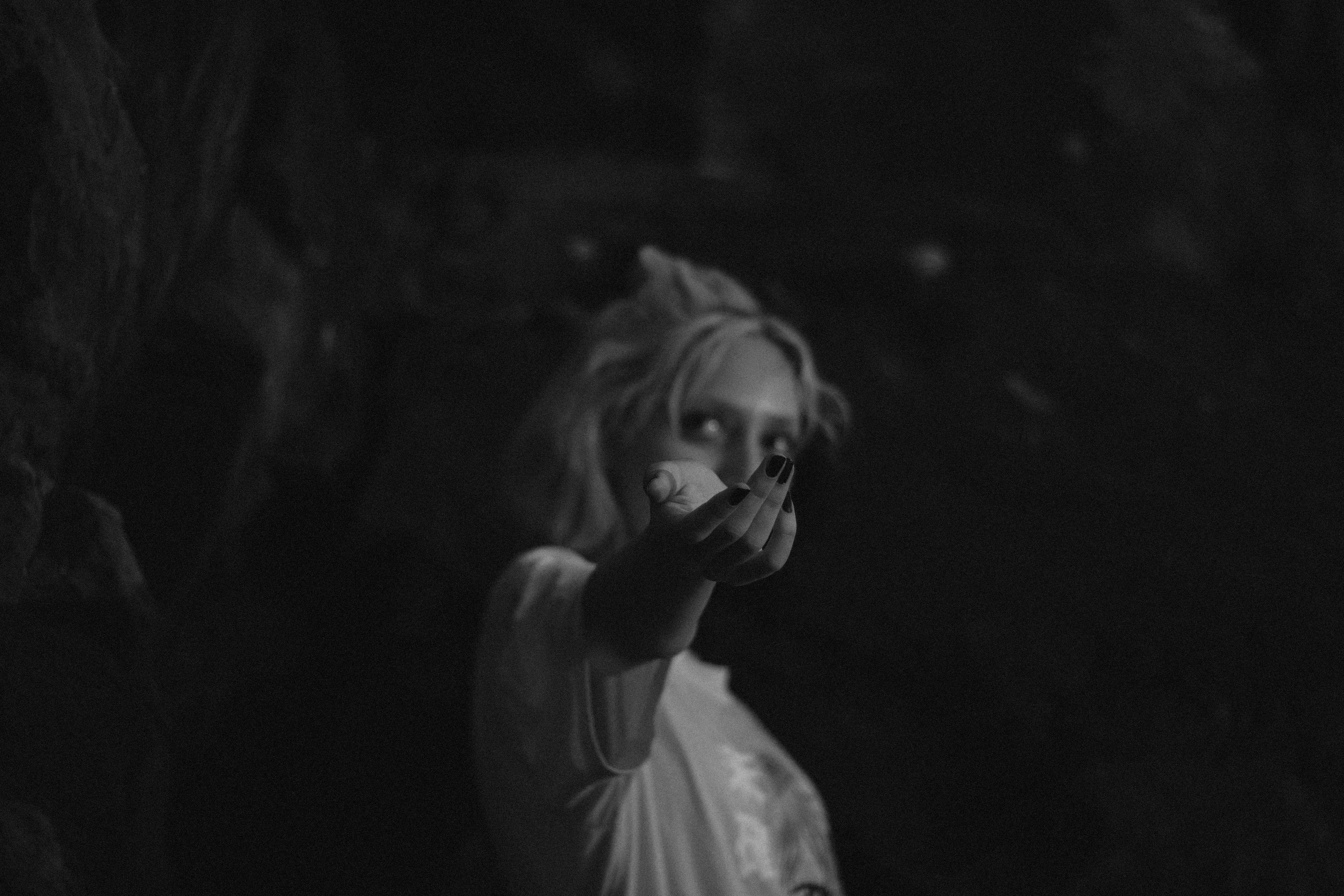 Black and White Photo of a Woman Reaching · Free Stock Photo