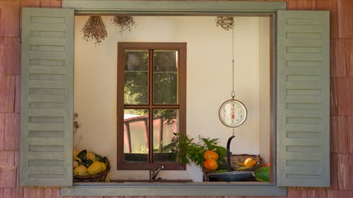 Vintage Weight Scale and Fruit behind Window