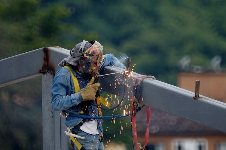 Man Welding A Construction