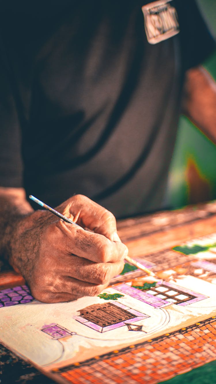 Artist Painting On Canvas