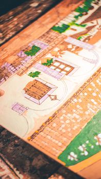 Brightly colored handmade painting featuring intricate details and creative expression.