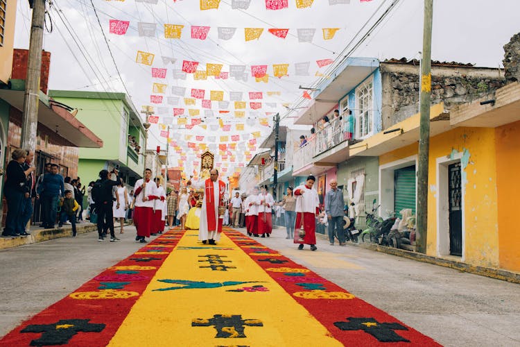 Crowd Of People Walking In A Procession