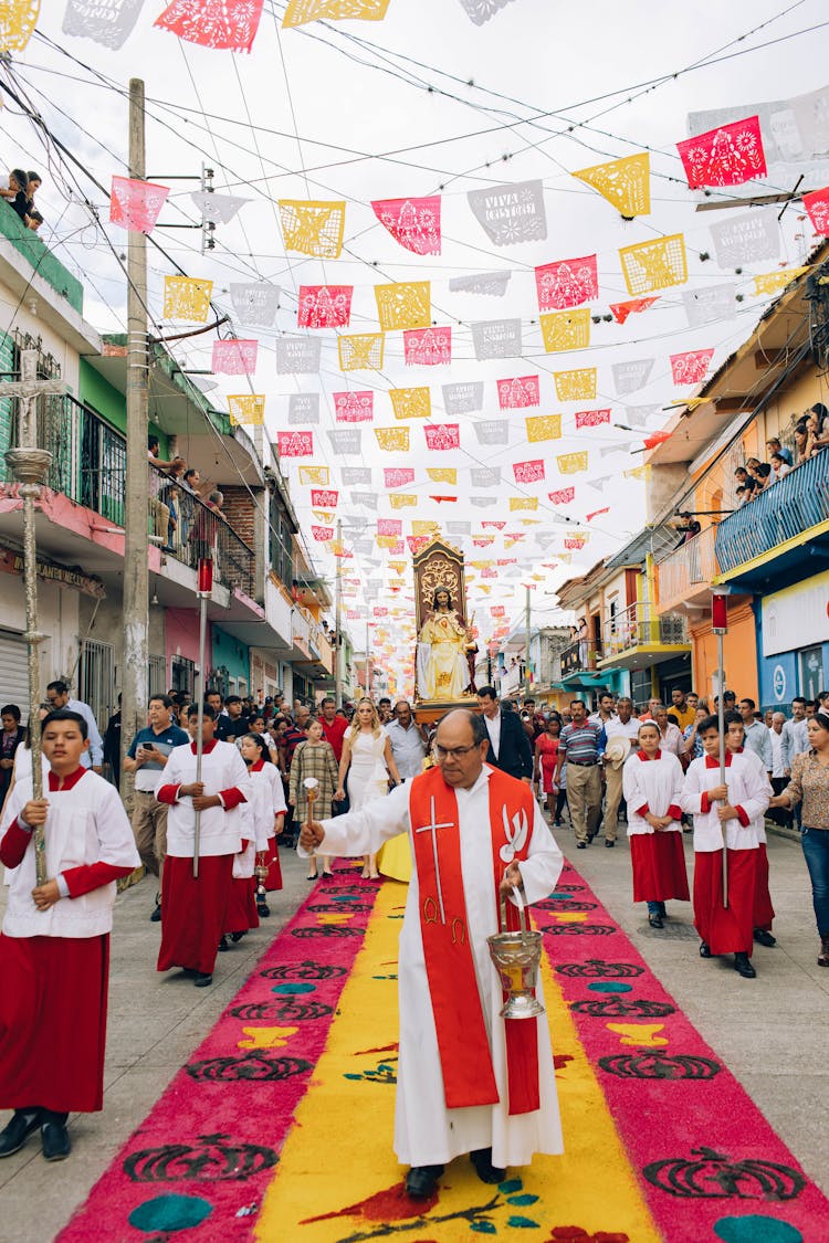 Photo Of Priest Sprinkling Holy Water During Celebration Of Cristo Rey In Mexico