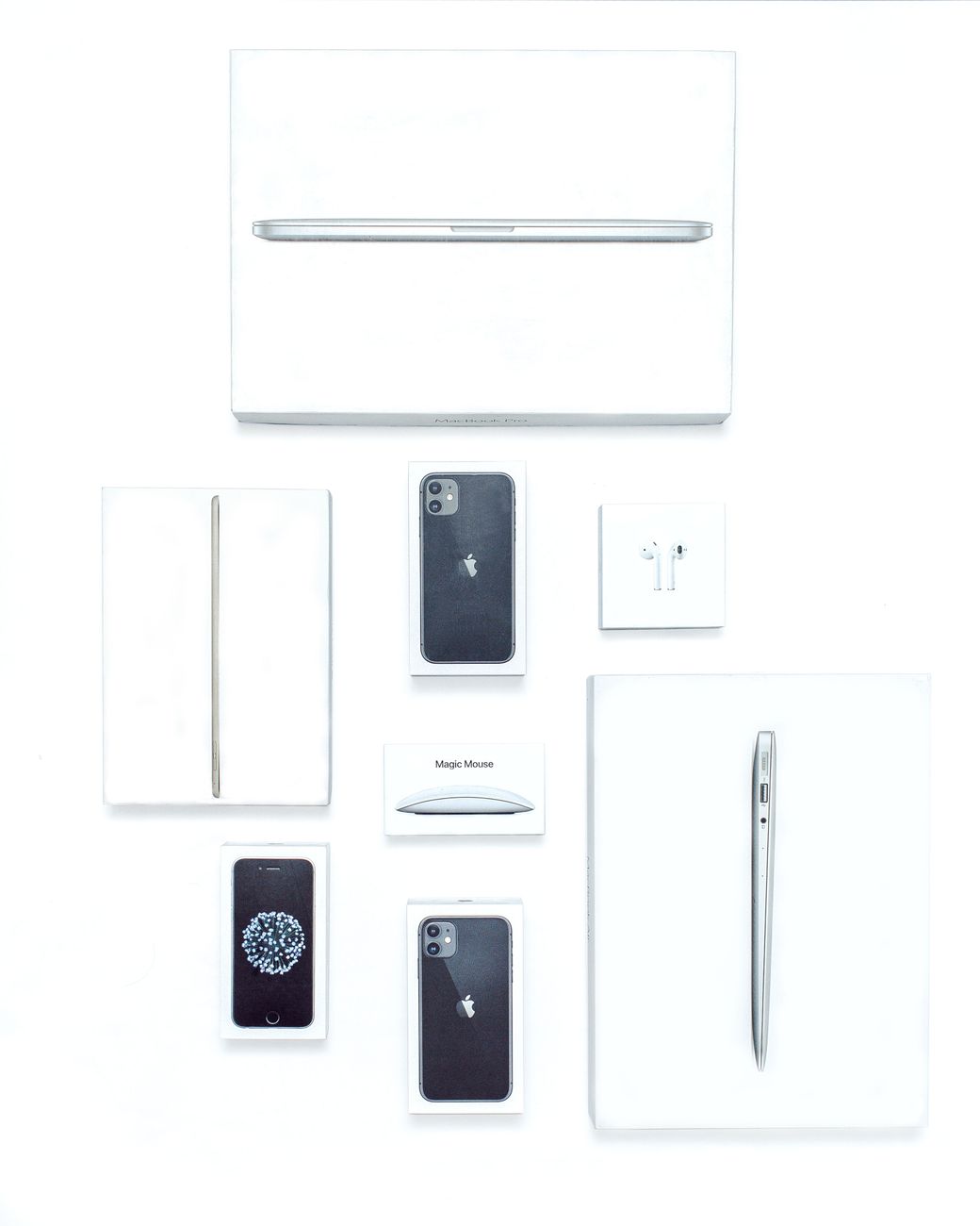 Flat lay image showcasing various tech gadgets and packaging on a white background, highlighting modern technology.. pexels,