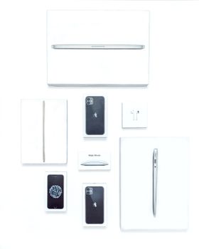 Flat lay image showcasing various tech gadgets and packaging on a white background, highlighting modern technology.. pexels, 