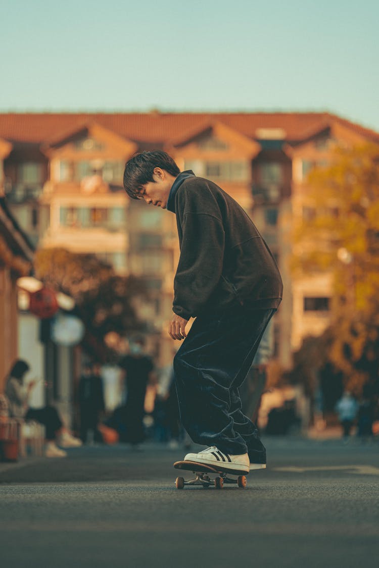 Man Riding A Skateboard