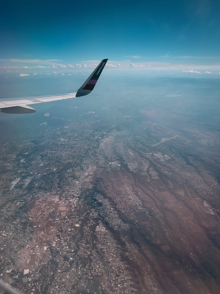 Plane Wing Above Land 