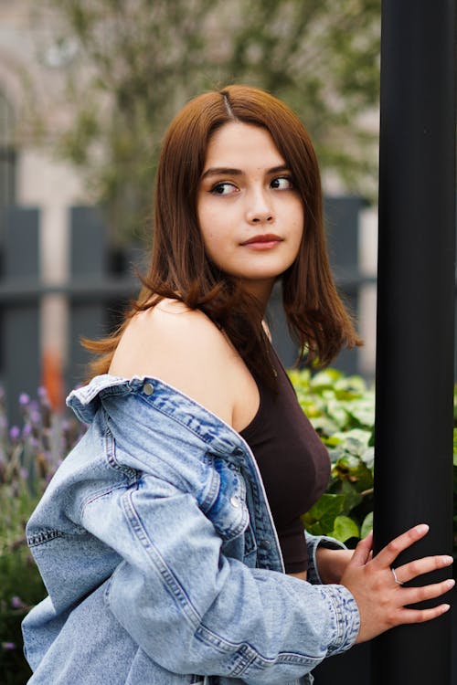 Woman in Black Tank Top and Blue Denim Jacket
