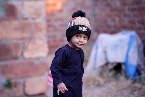 A Young Boy Wearing Beanie 