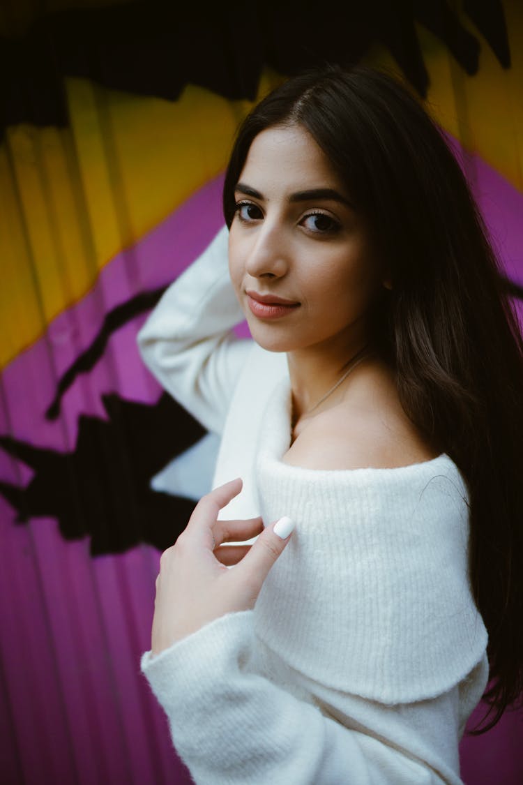 Portrait Photo Of A Beautiful Woman In White Off Shoulder Sweater